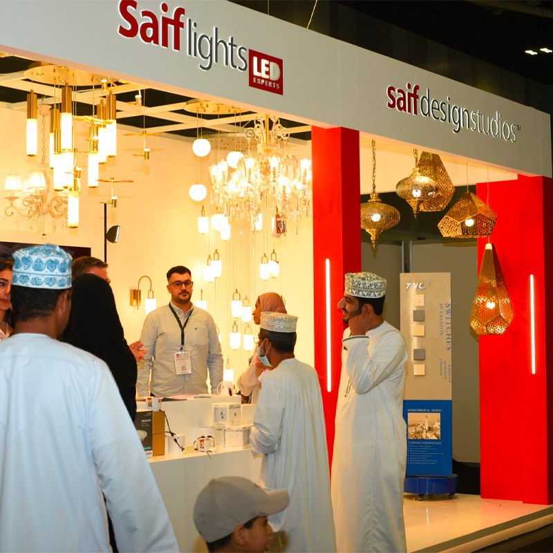 white hall with warm lighting at IDF Oman - a premier design & furnishing expo