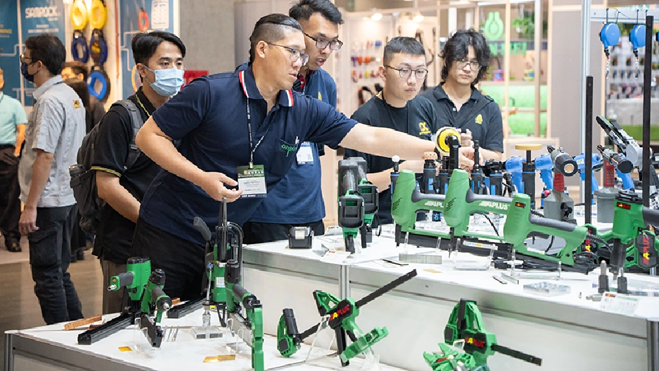 Exhibitors showcasing their hardware products to customers at Taiwan Hardware Show