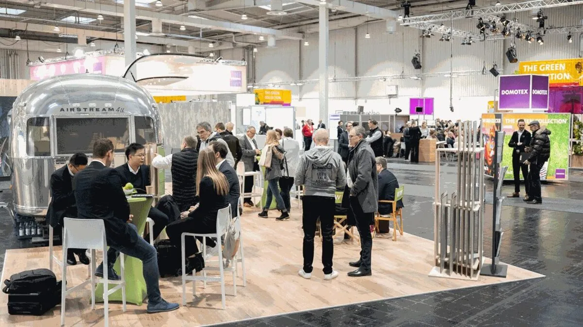 People visiting a DOMOTEX flooring expo