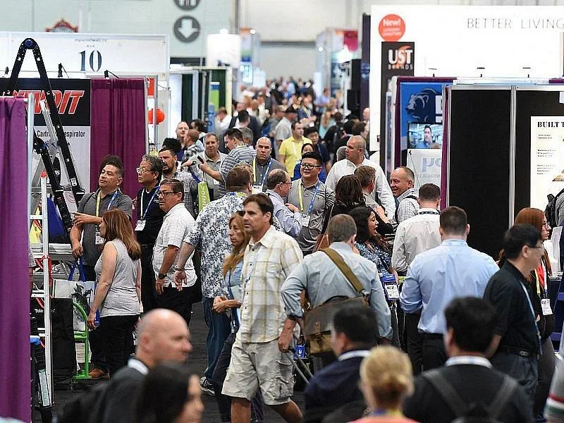 crowd examining stalls set up at National Hardware Show 2024 home improvement event 